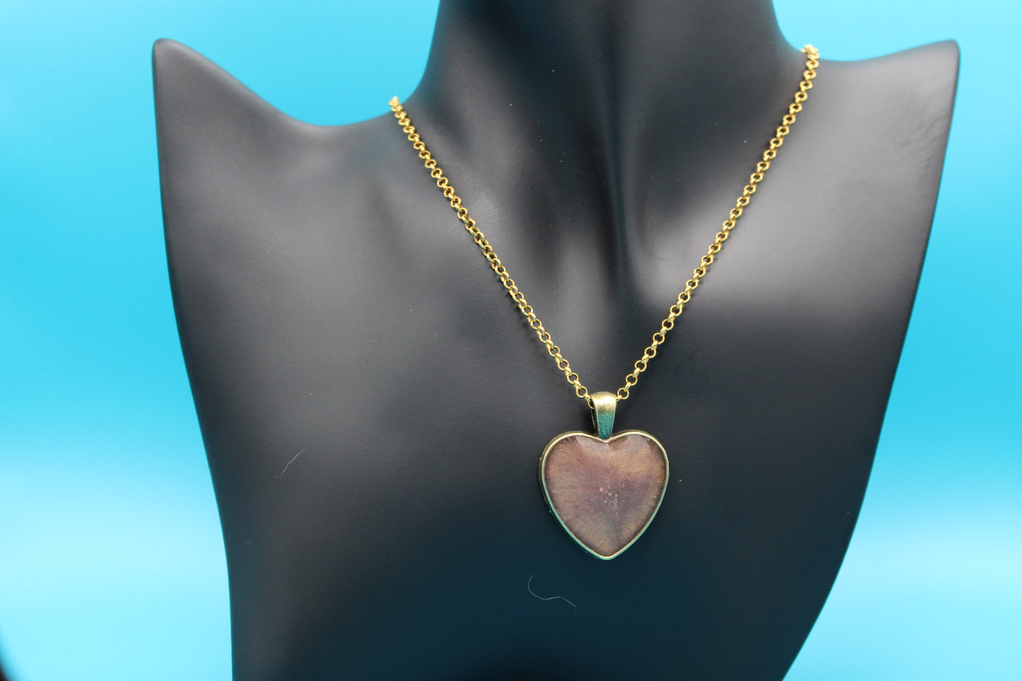 Orange heart pendant on aged bronze chain